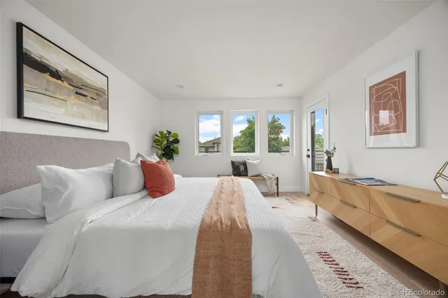 a spacious bathroom with a double vanity sink and a mirror