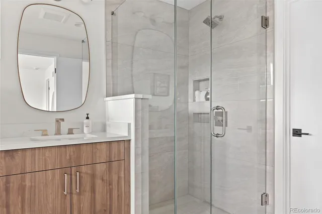 a view of entryway with wooden floor and stairs