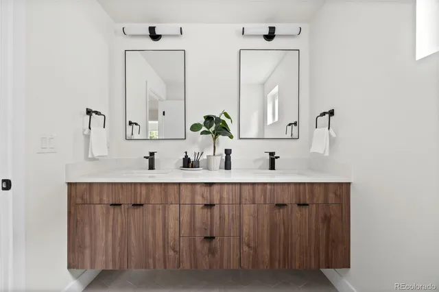 a view of a livingroom with furniture window and wooden floor