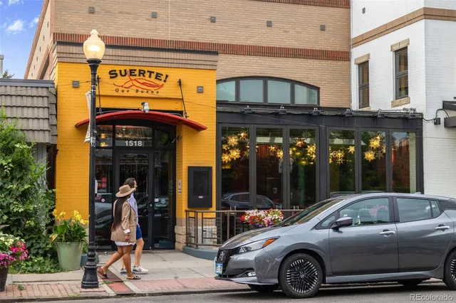 an aerial view of a city with lots of residential buildings