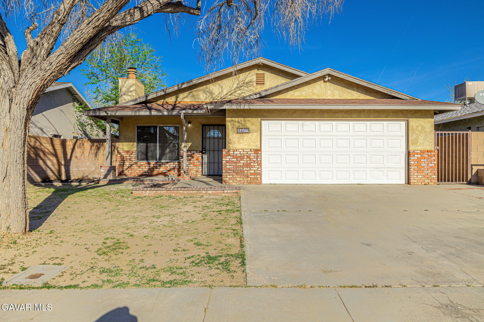 44422 Sancroft Avenue Lancaster, CA 93535 - Photo 1 of 35 a view of a house with a yard