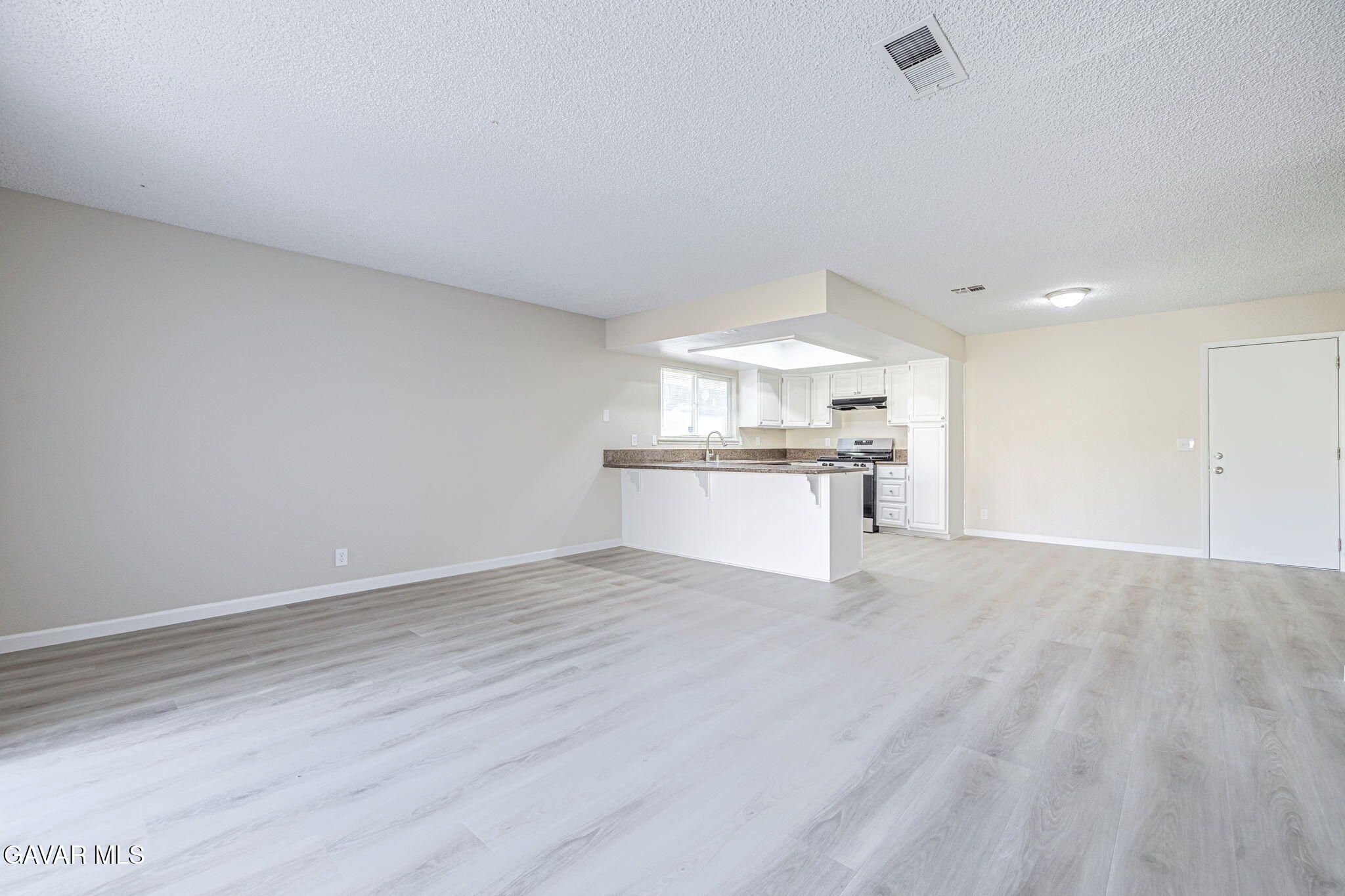 44422 Sancroft Avenue Lancaster, CA 93535 - Photo 14 of 35 a view of a kitchen with a sink