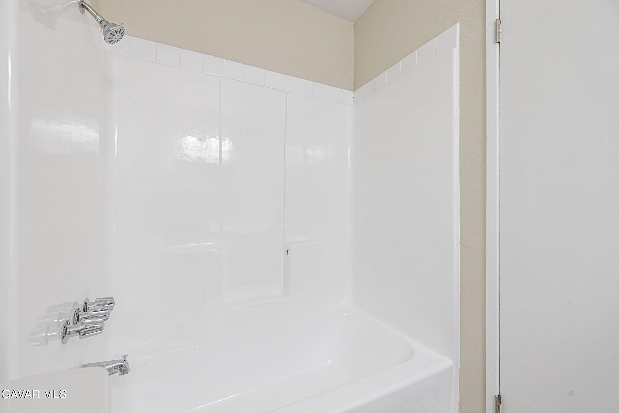 44422 Sancroft Avenue Lancaster, CA 93535 - Photo 19 of 35 a close up of a bathtub
