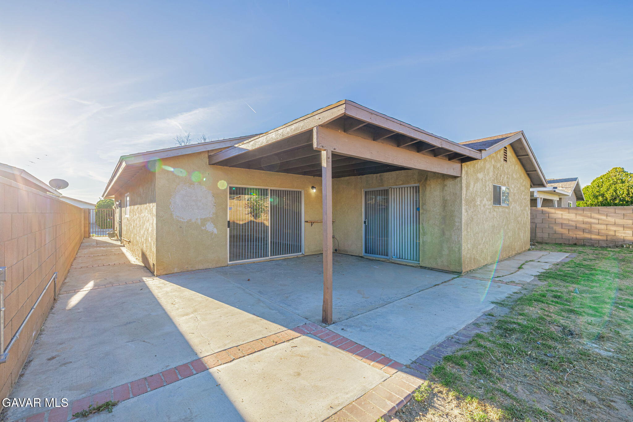 44422 Sancroft Avenue Lancaster, CA 93535 - Photo 29 of 35 a house view with a backyard space