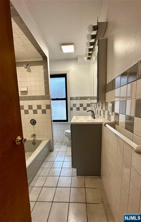 227 Hamilton Avenue, Unit 2 Hasbrouck Heights, NJ 07604 - Photo 23 of 27 a view of kitchen with cabinets and window