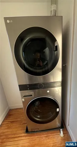 a bathroom with a toilet and washing machine