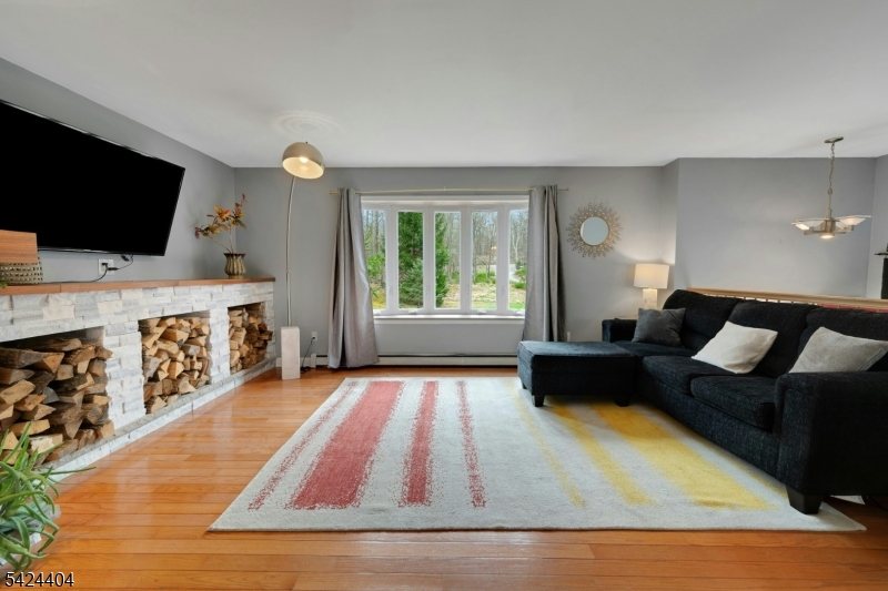 4 Andover Mohawk Road Sparta, NJ 07871 - Photo 14 of 35 a living room with furniture and a flat screen tv