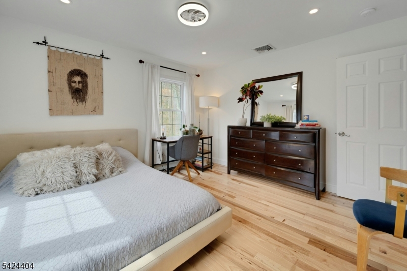 4 Andover Mohawk Road Sparta, NJ 07871 - Photo 23 of 35 a bedroom with a bed and a table