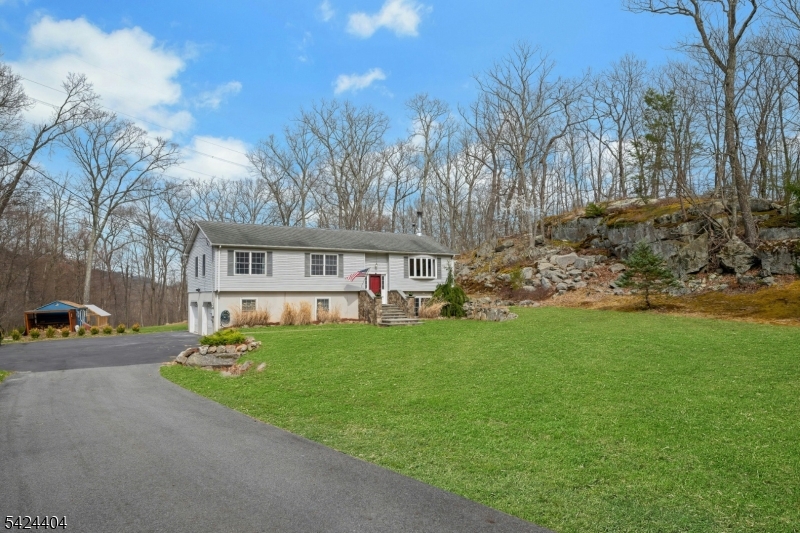 4 Andover Mohawk Road Sparta, NJ 07871 - Photo 3 of 35 a front view of a house with garden