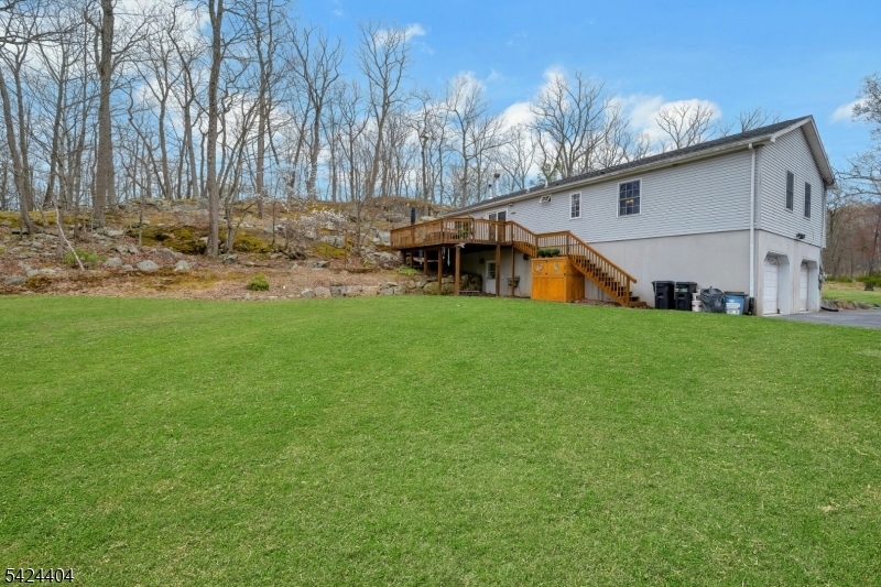 4 Andover Mohawk Road Sparta, NJ 07871 - Photo 34 of 35 a view of a house with backyard