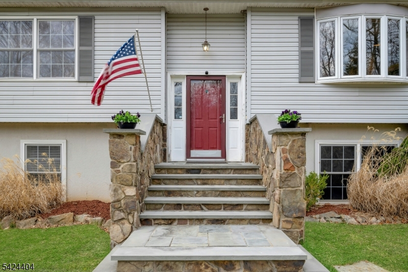 4 Andover Mohawk Road Sparta, NJ 07871 - Photo 5 of 35 a front view of a house with entryway