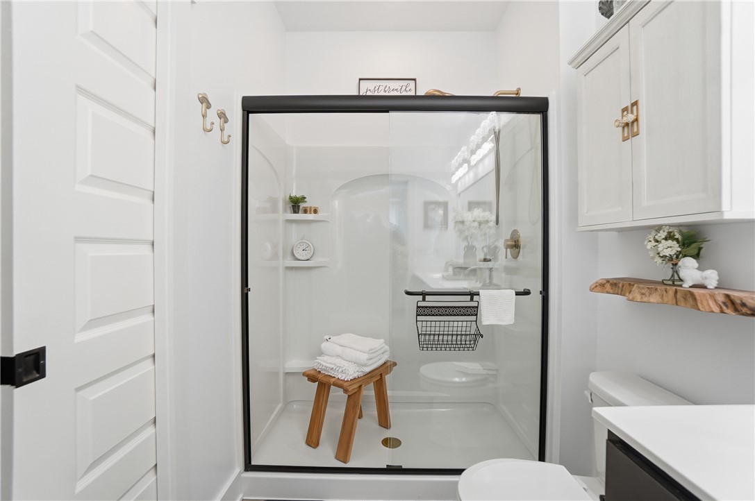 605 Cape Cod Court Beavercreek, OH 45430 - Photo 28 of 54 This bathroom features a contemporary shower and elegant built-in storage solutions.