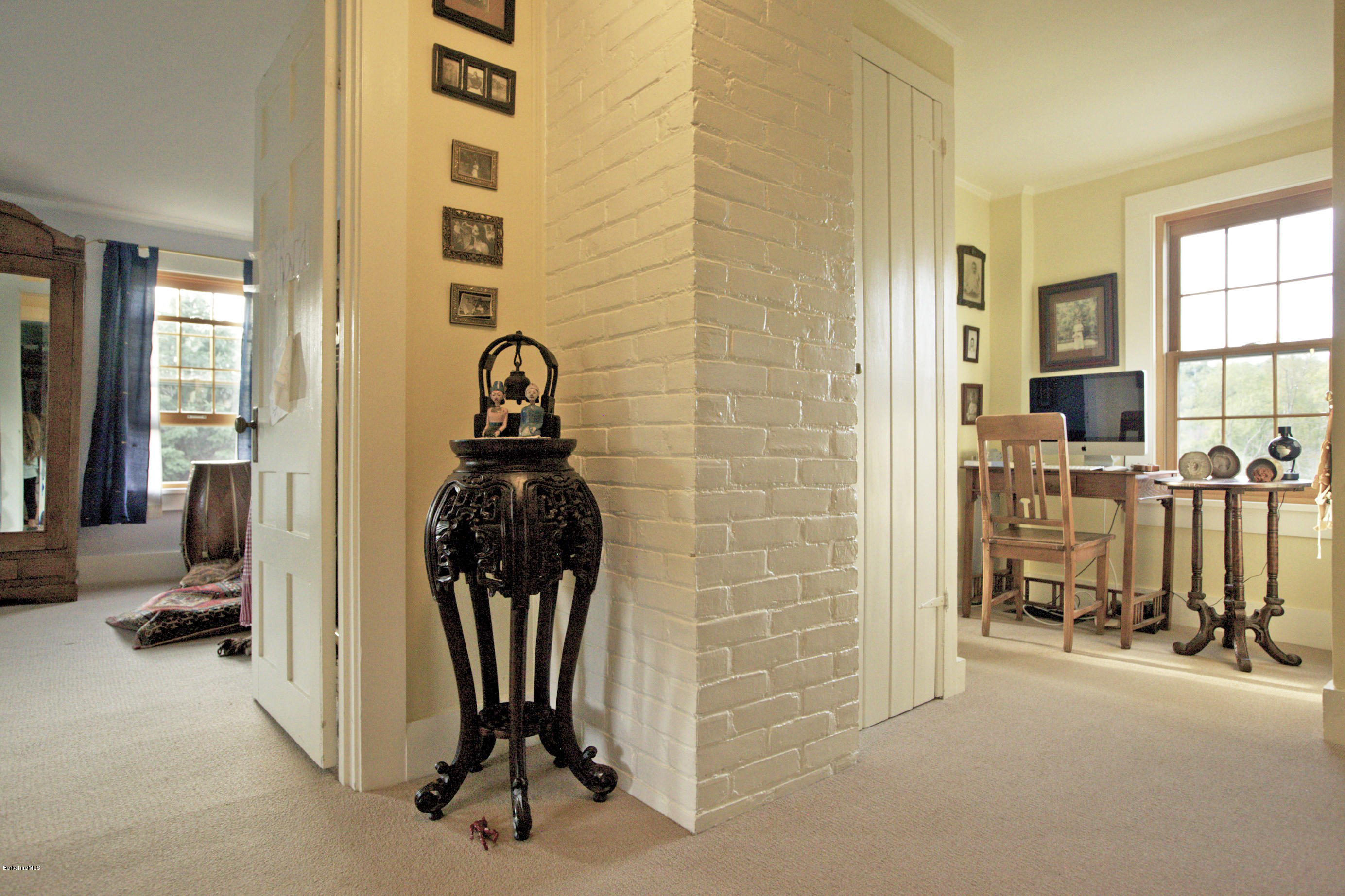 1286 Monterey Road Otis, MA 01253 - Photo 26 of 43 a view of a hallway with living room and furniture