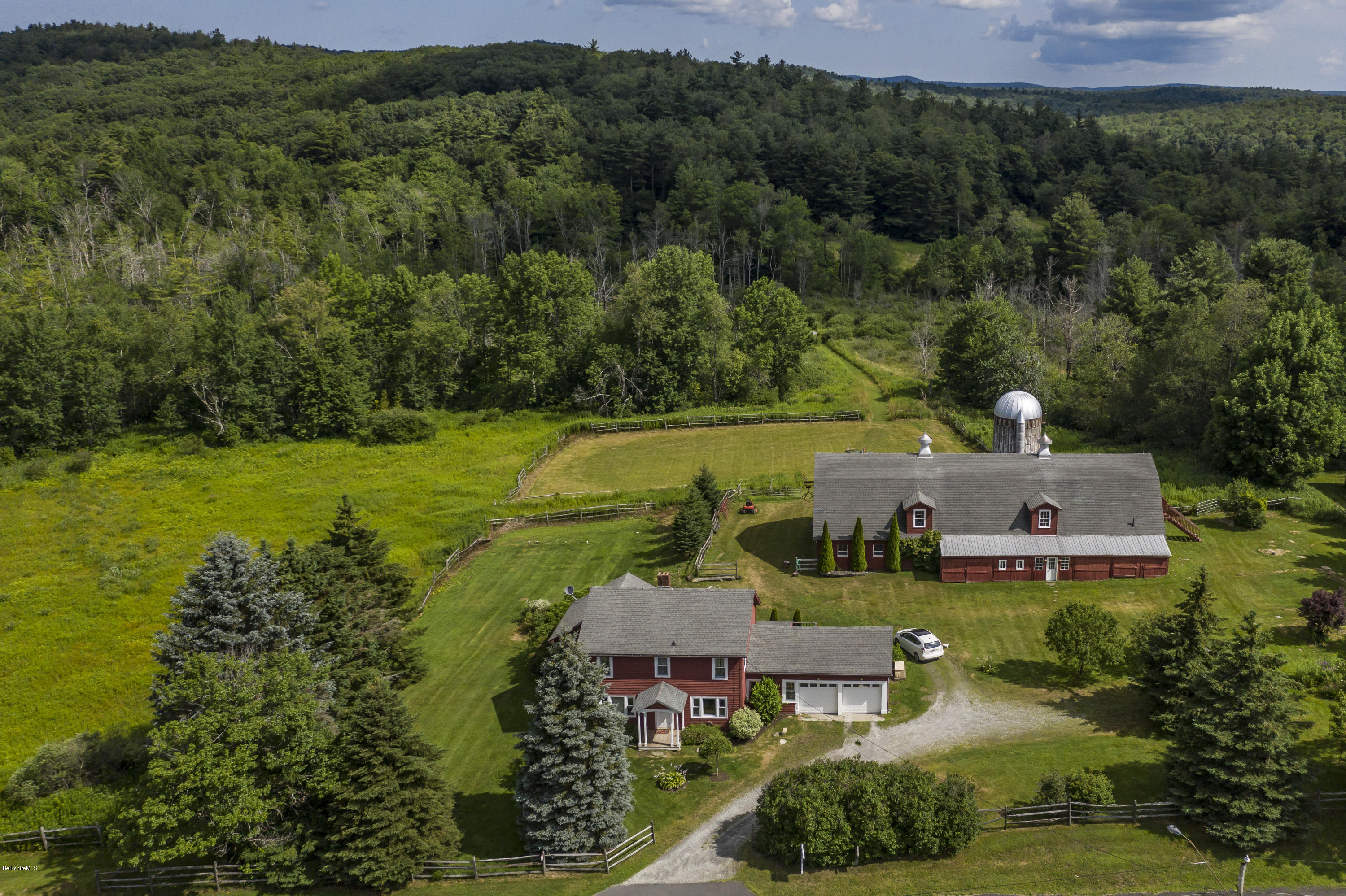 1286 Monterey Road Otis, MA 01253 - Photo 43 of 43 an aerial view of a house with a garden