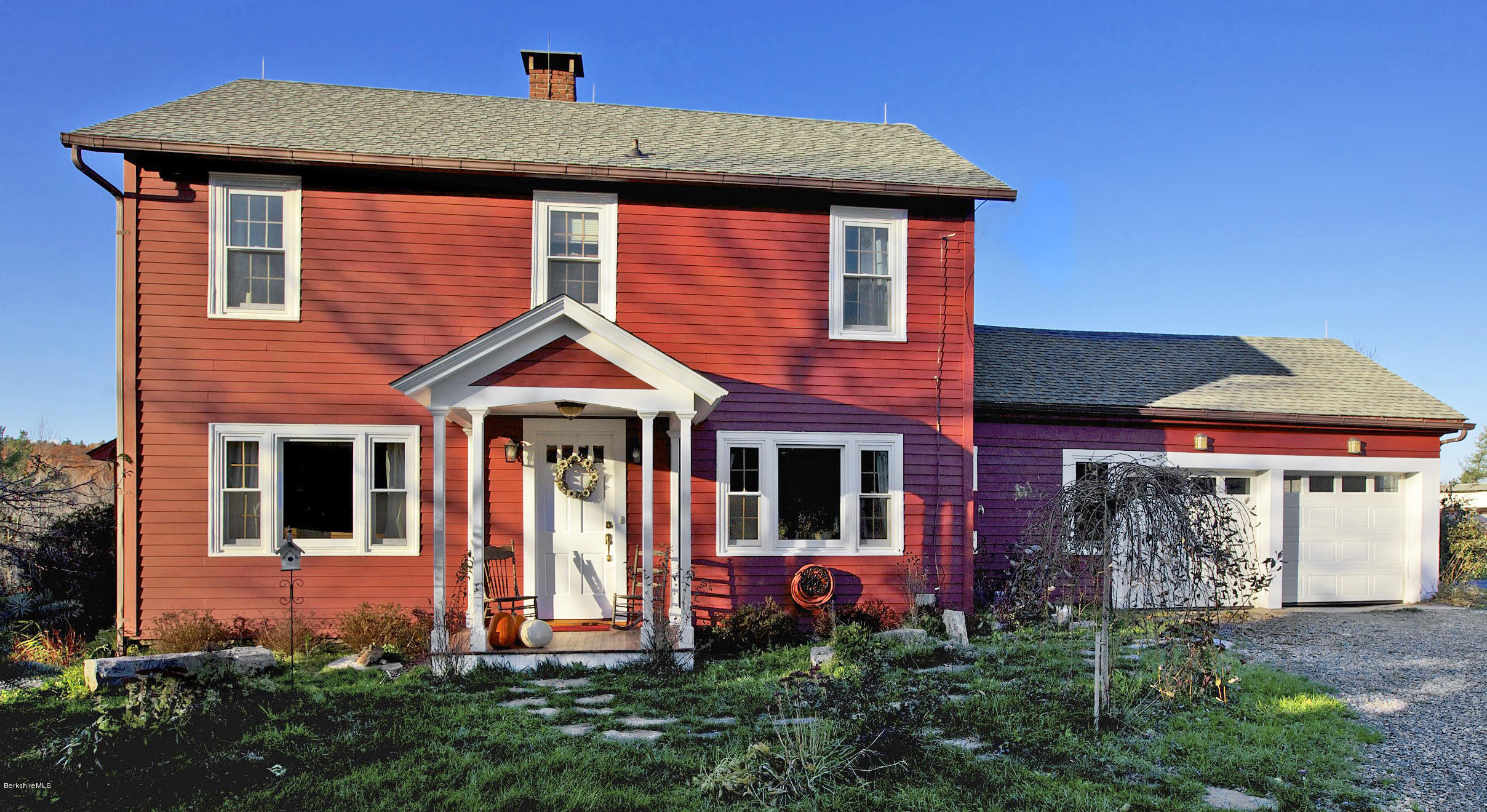 1286 Monterey Road Otis, MA 01253 - Photo 6 of 43 a front view of a house with garden