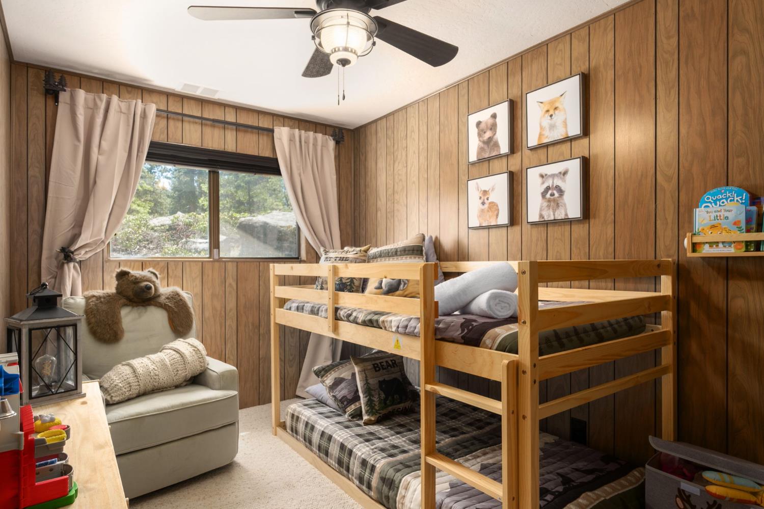 42488 Rock Ledge Road Shaver Lake, CA 93664 - Photo 24 of 26 a bedroom with furniture and a large window