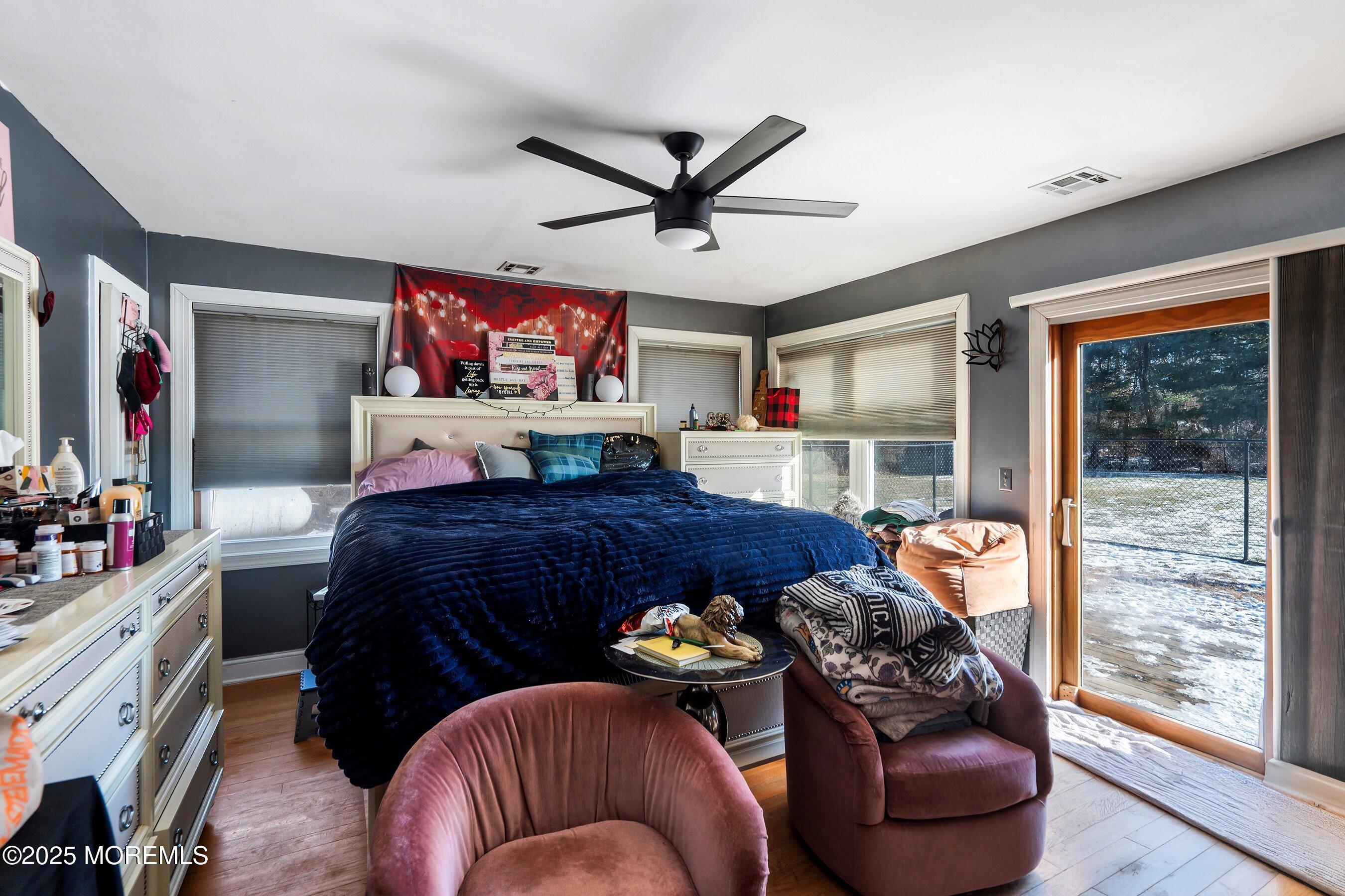 319 Jackson Mills Road Freehold, NJ 07728 - Photo 13 of 30 a bedroom with furniture and a large window