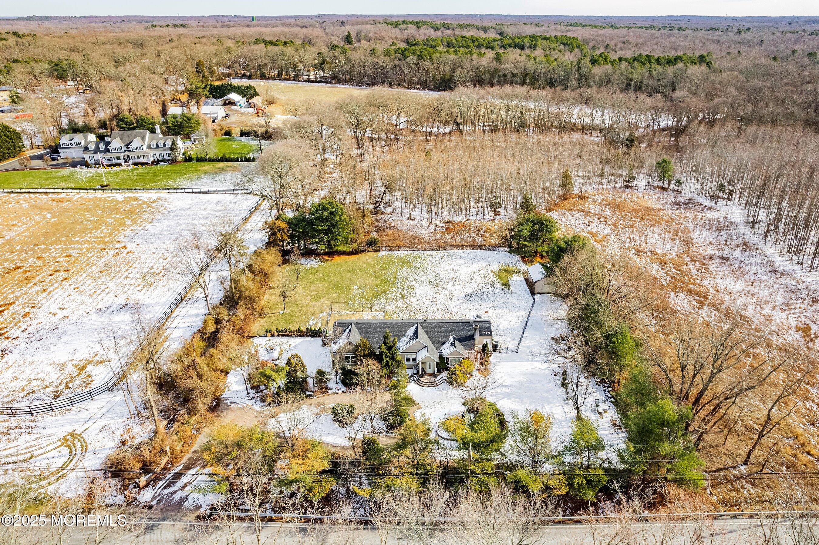 319 Jackson Mills Road Freehold, NJ 07728 - Photo 2 of 30 an aerial view of residential houses with outdoor space
