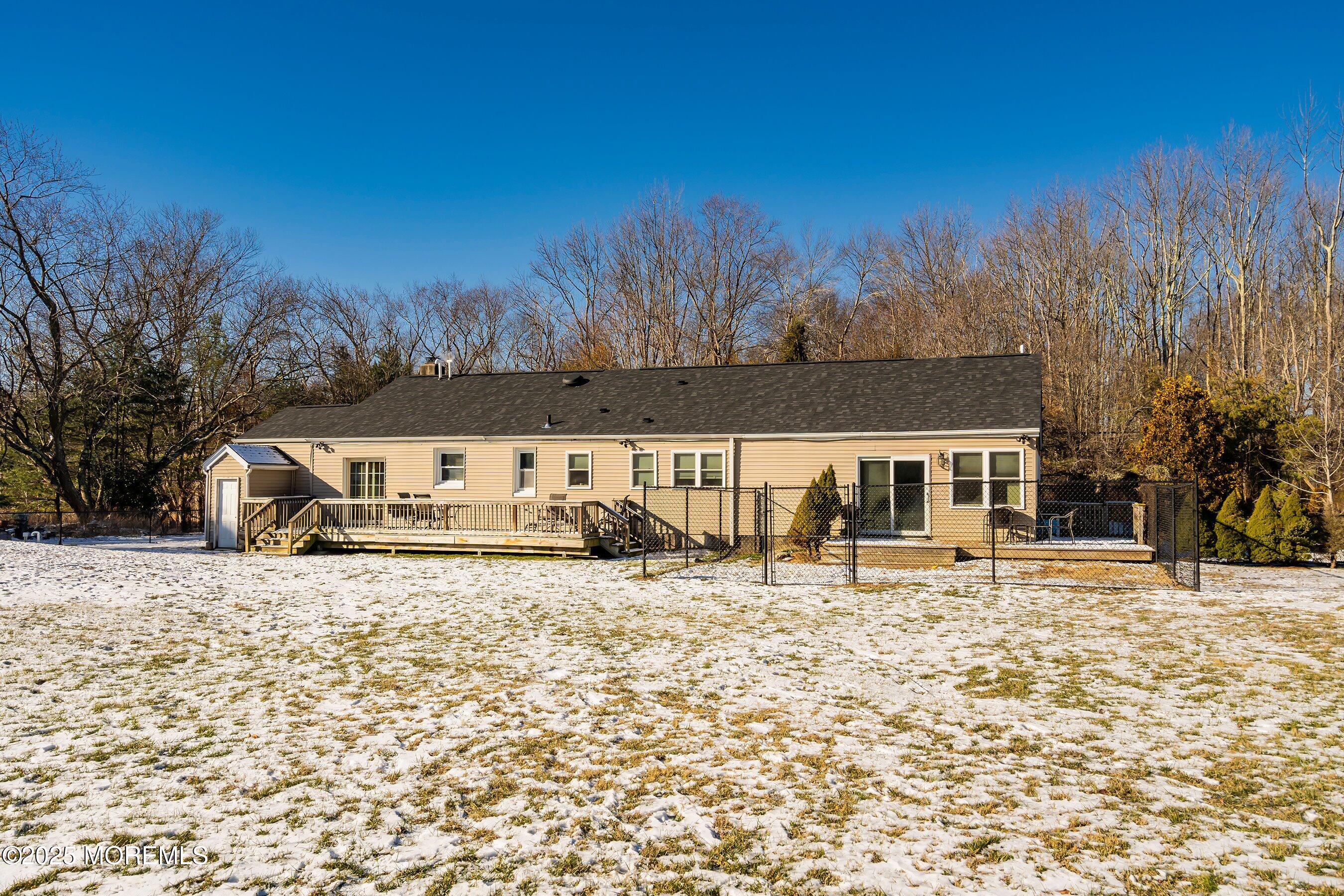 319 Jackson Mills Road Freehold, NJ 07728 - Photo 25 of 30 a house that has a tree in front of it