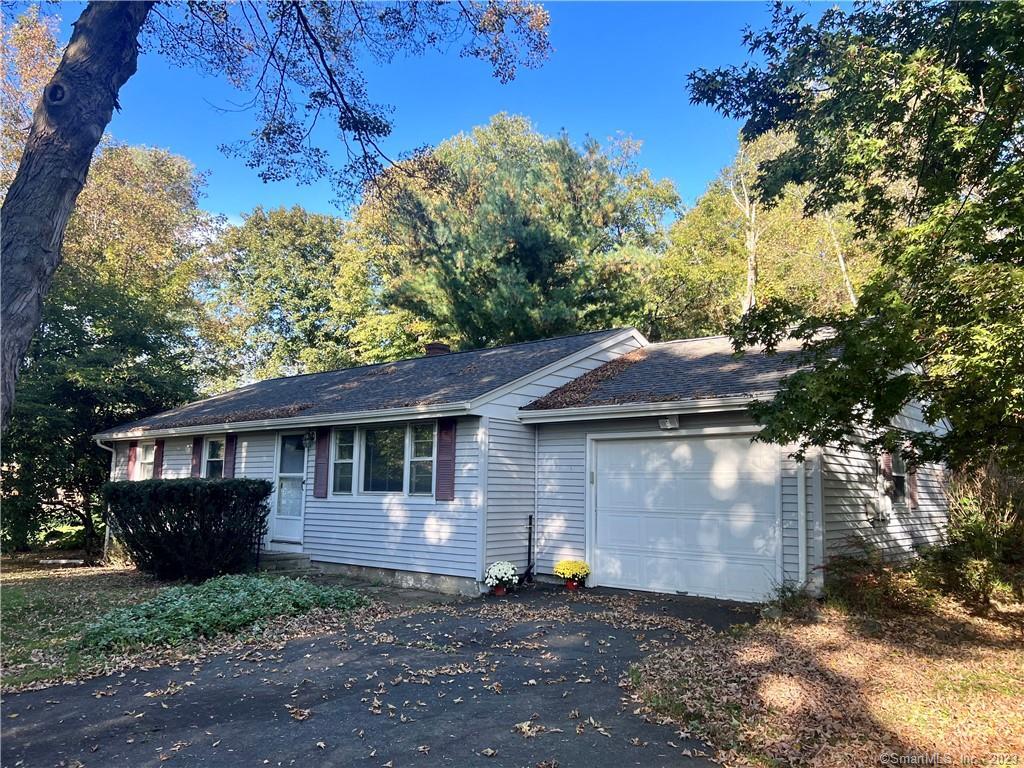 15 Harbor Ridge Road Danbury, CT 06811 - Photo 1 of 1 a front view of a house with a garden