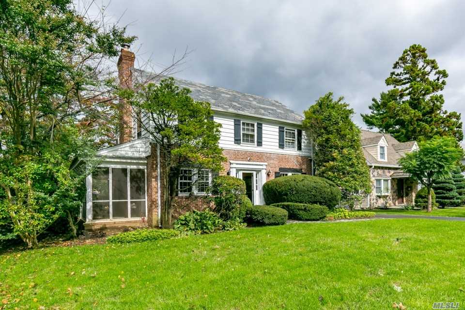 a view of a house with a garden