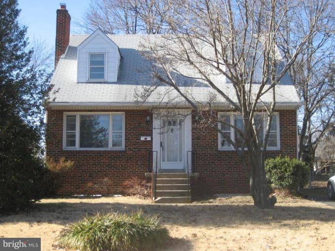 8710 Edmonston Road Berwyn Heights, MD 20740 - Photo 1 of 13 a front view of a house