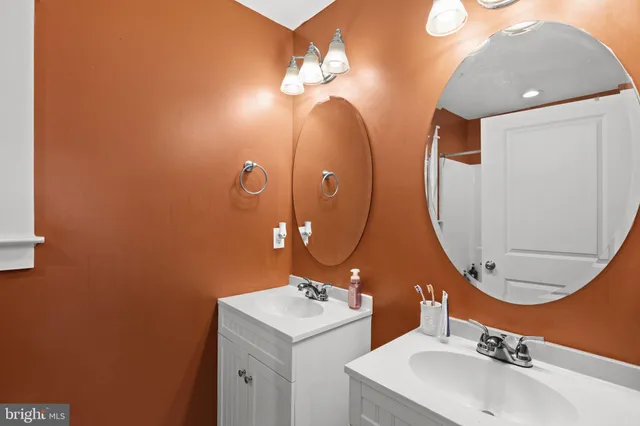 a bathroom with a shower and a bath tub