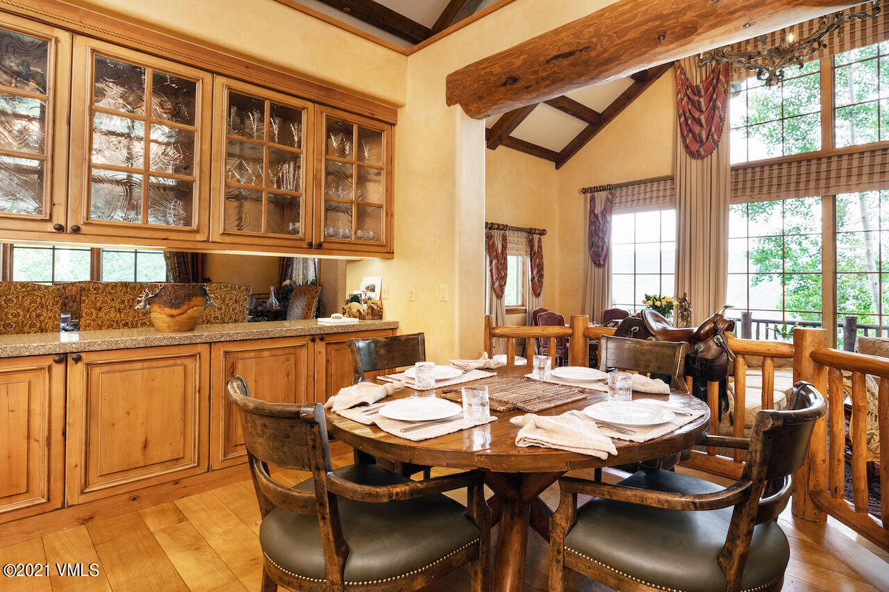 110 Bear Paw, Unit A Avon, CO 81620 - Photo 3 of 19 a view of a dining room with furniture window and outside view