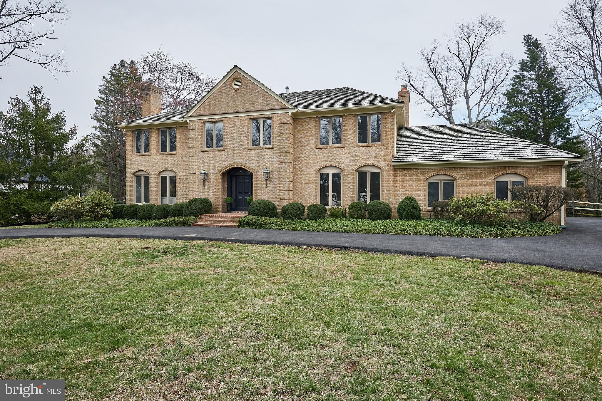 Stately all brick home on one-acre in the Village!