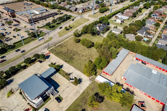 an aerial view of house with yard