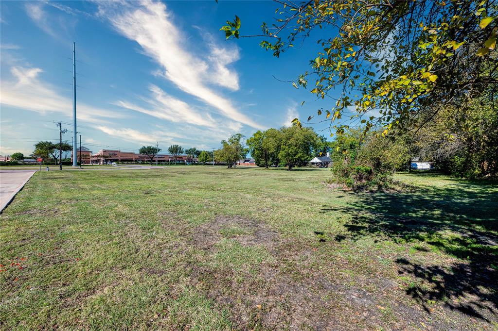 2640 North Shiloh Road Garland, TX 75044 - Photo 7 of 17 a view of a field with an trees