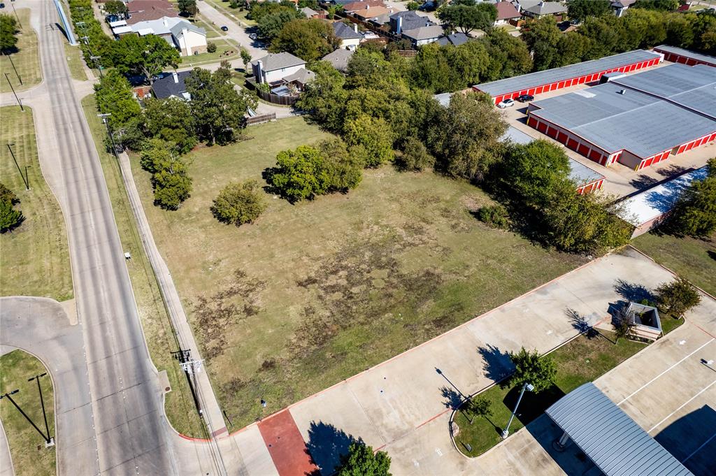 2640 North Shiloh Road Garland, TX 75044 - Photo 9 of 17 an aerial view of a house with a yard