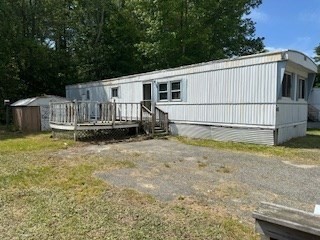 51 Monson Turnpike Road, Unit 1015 Ware, MA 01082 - Photo 3 of 9 a backyard of a house
