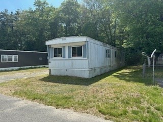 51 Monson Turnpike Road, Unit 1015 Ware, MA 01082 - Photo 4 of 9 a view of a backyard