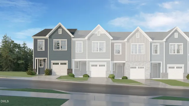 a living room with furniture kitchen view and a table