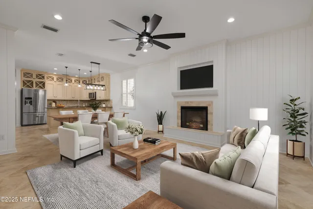 a large kitchen with granite countertop a stove cabinets and refrigerator