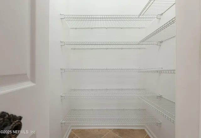 a bathroom with a tub and a shower