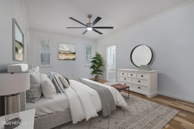 a white toilet sitting next to a white sink