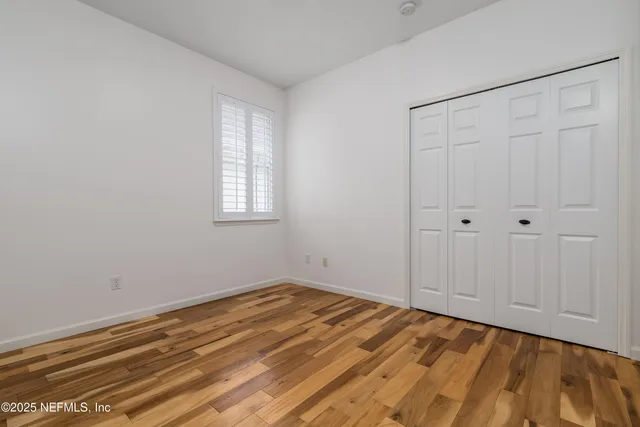 a swimming pool with outdoor seating and yard