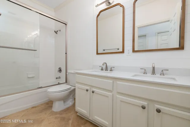 a view of a chairs and table in the patio