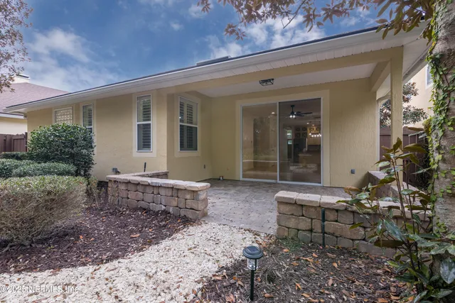 a view of a balcony with wooden floor
