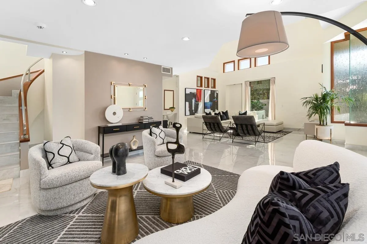 7911 El Paseo Grande La Jolla, CA 92037 - Photo 27 of 32 a living room with furniture and wooden floor