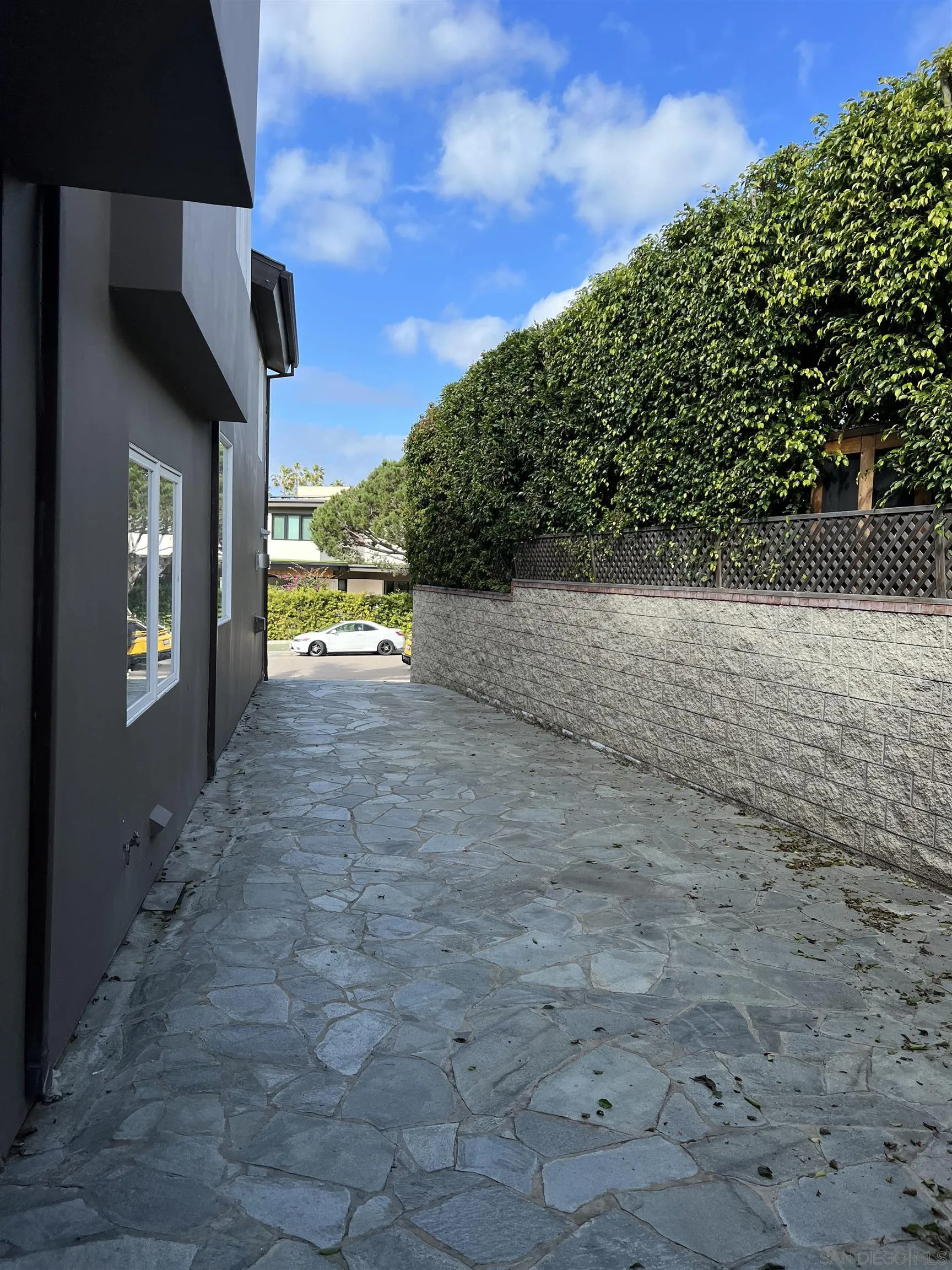 7911 El Paseo Grande La Jolla, CA 92037 - Photo 32 of 32 a view of an outdoor space and porch