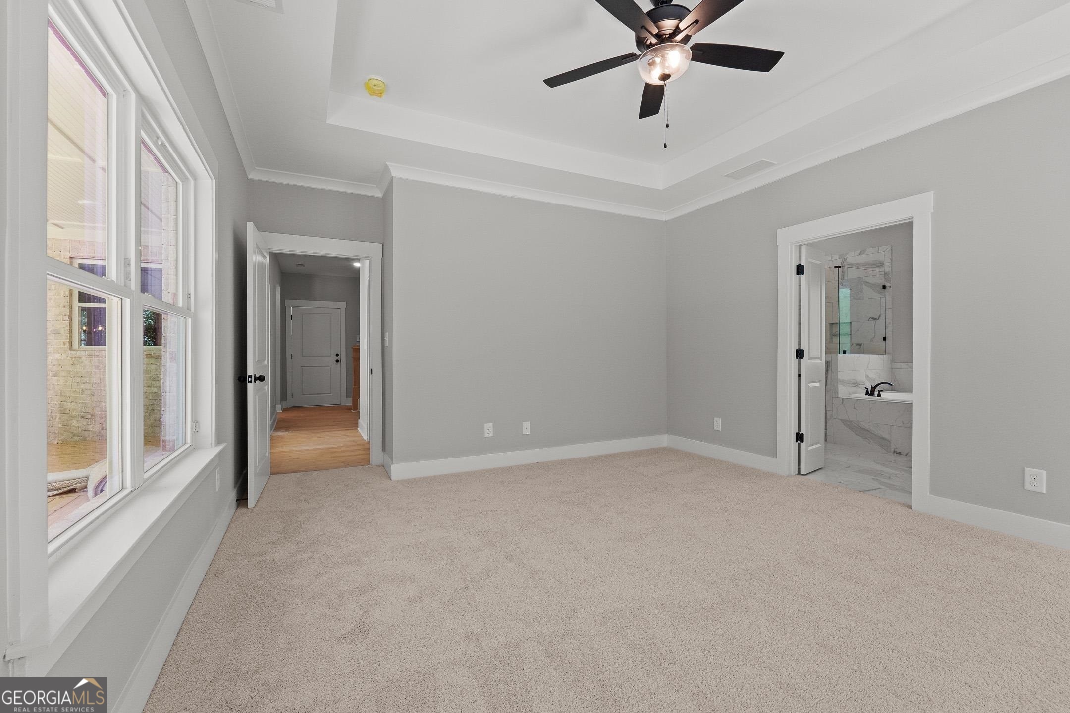 2000 Millstream Court Griffin, GA 30224 - Photo 19 of 49 an empty room with fan and windows