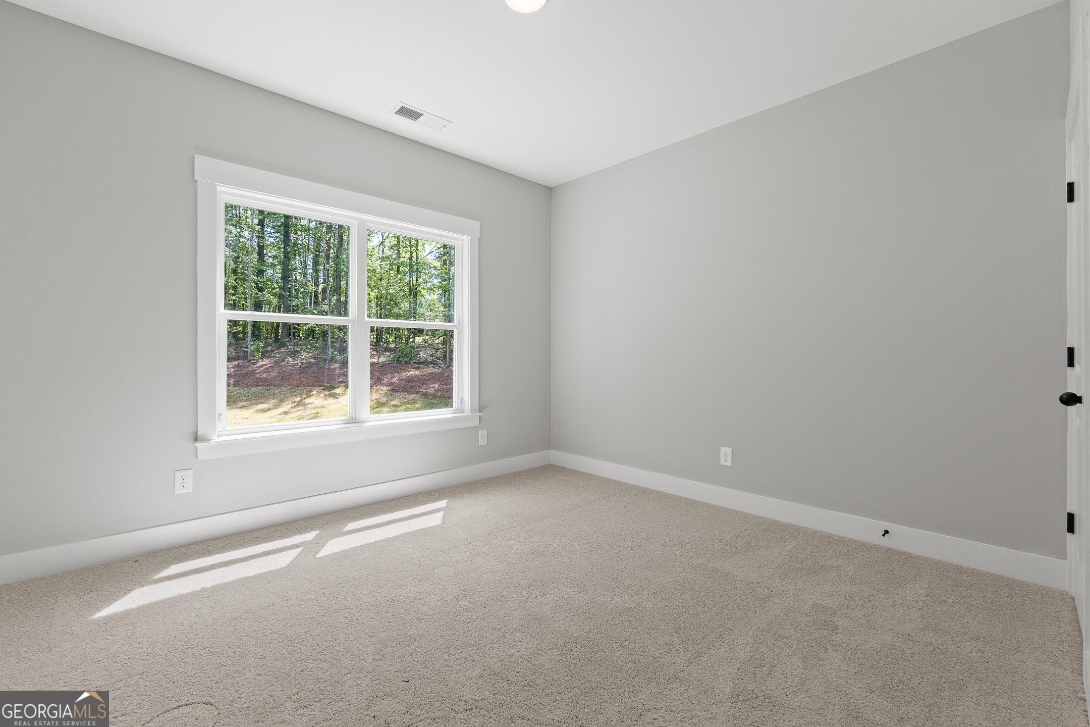 2000 Millstream Court Griffin, GA 30224 - Photo 30 of 49 an empty room with a window