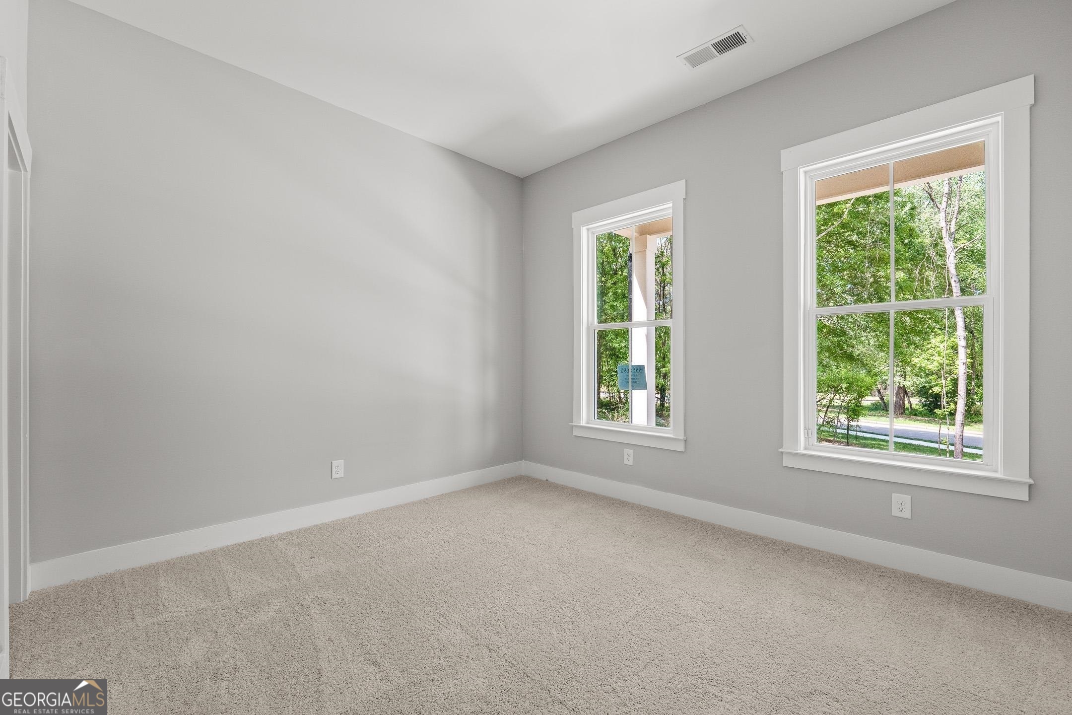 2000 Millstream Court Griffin, GA 30224 - Photo 33 of 49 an empty room with windows