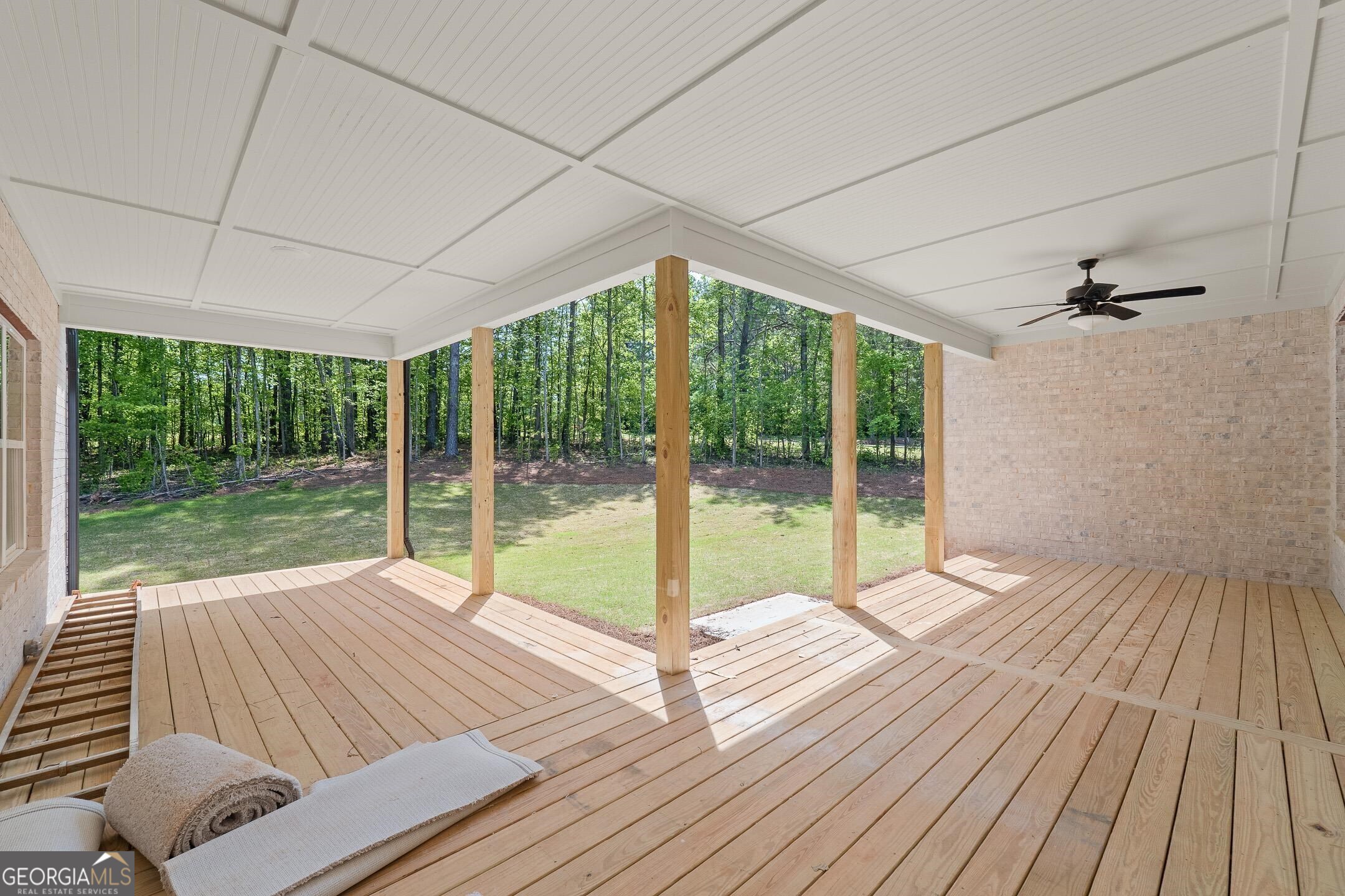 2000 Millstream Court Griffin, GA 30224 - Photo 37 of 49 a view of porch with wooden floor and fence