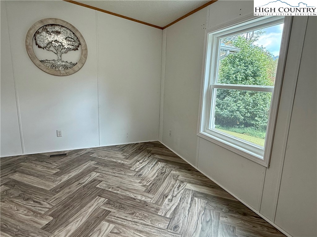 304 The Mulberry Cove Road Boone, NC 28607 - Photo 18 of 45 a view of a room with a large window