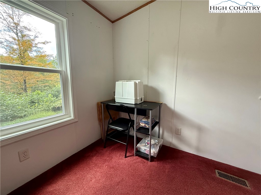 304 The Mulberry Cove Road Boone, NC 28607 - Photo 22 of 45 a view of an empty room with a window