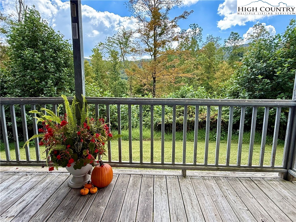 304 The Mulberry Cove Road Boone, NC 28607 - Photo 3 of 45 a view of a balcony with chairs